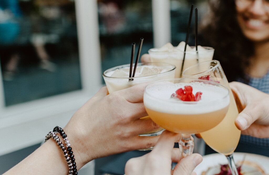 A group of people enjoying cocktails