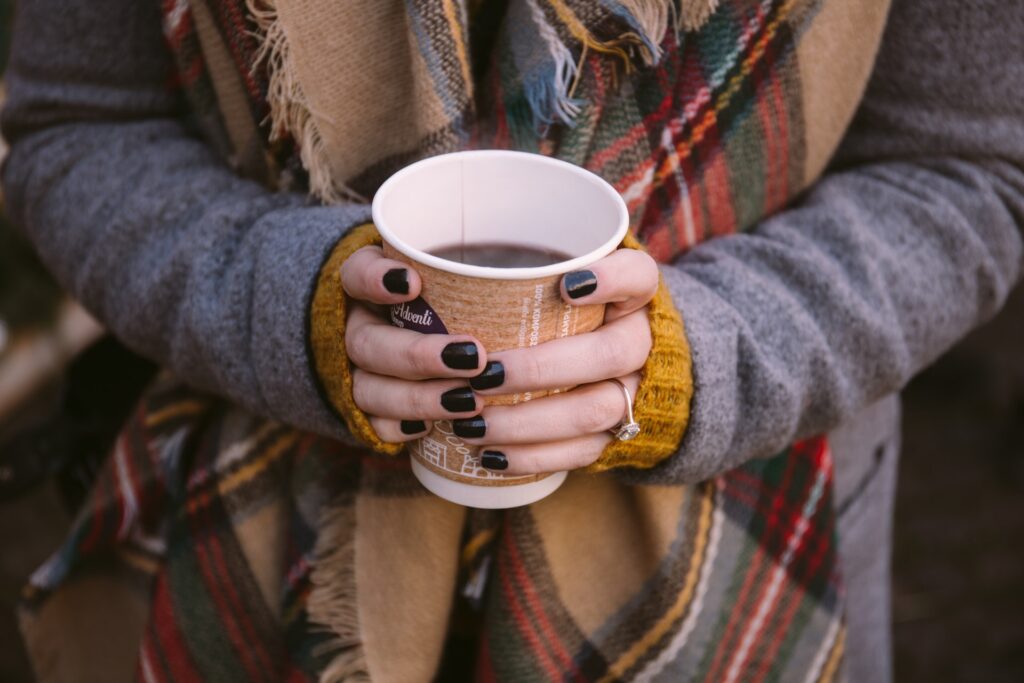 woman holding mulled wine